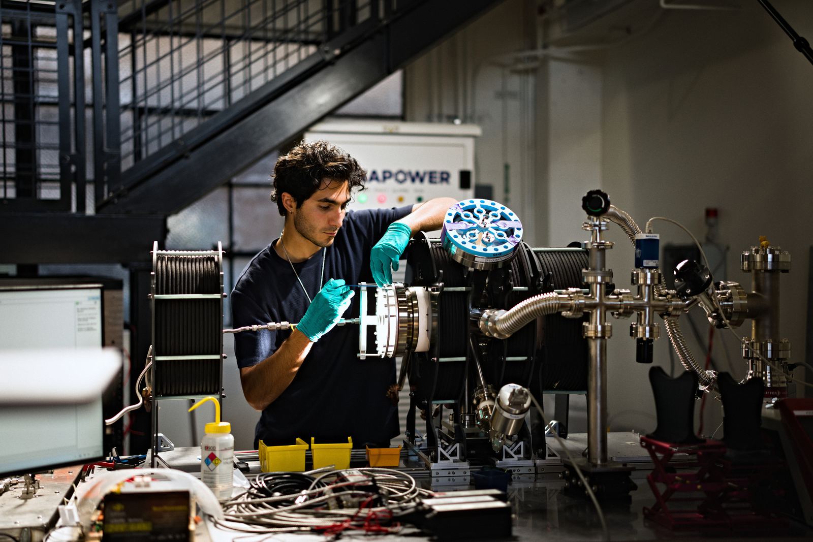 Engineer working on Marathon's plasma centrifuge
