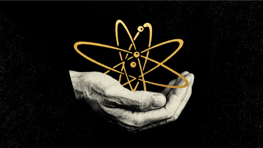 Illustration of a hand holding a gold atom